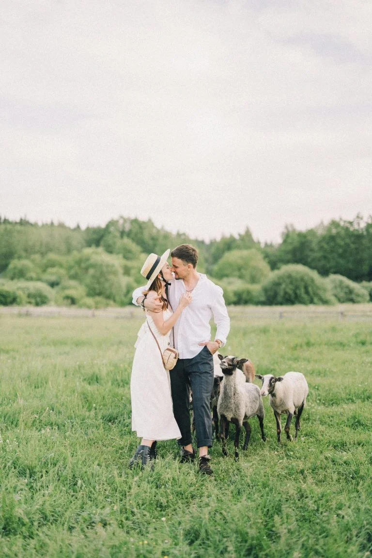 man and woman enjoying a romantic moment in a field with sheep - benefits of quitting porn